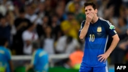 Argentina's forward and captain Lionel Messi reacts after losing the 2014 FIFA World Cup final football match between Germany and Argentina 1-0 following extra-time at the Maracana Stadium in Rio de Janeiro, Brazil, on July 13, 2014.