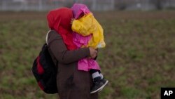 Réfugiés syriens dans le camp d'Idomeni, en Grèce le 4 mars 2016. 