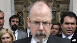 FILE - U.S. Attorney John Durham speaks to reporters on the steps of U.S. District Court in New Haven, Conn. 