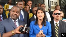 Nikki Haley, U.S. ambassador to the United Nations, center, meets with President of Congo's Election commission, Corneil Nangaa, left, during a meeting in Kinshasa, Congo, Oct. 27, 2017.