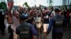 Residents celebrate in Kinshasa, Jan. 10, 2019, after learning that opposition presidential candidate Felix Tshisekedi has been declared the winner of the elections. 