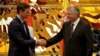 FILE - Spain's Prime Minister Pedro Sanchez, left, and Cuba's President Miguel Diaz-Canel shake hands at the Palace of The Revolution in Havana, Cuba, Nov. 22, 2018. 