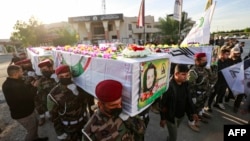مراسم تشییع جنازه شبه‌نظامیان کشته شده حشدالشعبی در بغداد