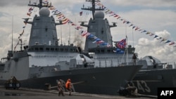 The Russian Navy corvettes "Hero of the Russian Federation Aldar Tsydenzhapov," left, and "Rezkiy" are seen docked at North Jamrud pier of Tanjung Perak port for a five-day joint military exercise between Indonesia and Russia, in Surabaya, Nov. 4, 2024. 