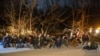 FILE - Greek Army soldiers detain a group of migrants that crossed from Turkey to Greece, near the village of Protoklisi, in the region of Evros, Greece, March 10, 2020. 