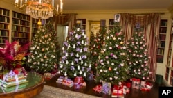 The Library on the ground floor of the White House on Dec. 2, 2015, in Washington as Christmas decorations for 2015 are unveiled. 