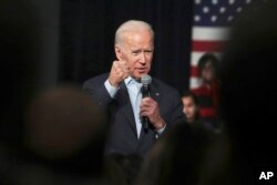 FILE - A photo of Democratic presidential candidate former Vice President Joe Biden in Exeter, N.H on Dec. 30, 2019. A selectively edited video suggesting he made racist remarks during a speech appeared in January 2020 on social media and attracted more than a million views.