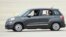 FILE - Pope Francis waves from inside a Fiat 500L as he departs Andrews Air Force Base in Maryland, Sept. 22, 2015. One of the two Fiats used by Pope Francis during his visit to Philadelphia last year is going up for auction. 