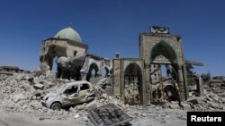 FILE - The destroyed Grand al-Nuri Mosque is seen in the Old City of Mosul, Iraq, Aug. 7, 2017. 