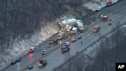 This image by KDKA TV shows the scene near Greensburg, Pa. along the Pennsylvania Turnpike where multiple people were killed and dozens were injured in a crash early Sunday, Jan. 5, 2020 that involved multiple vehicles, a transportation official said. 