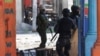 FILE - Kenyan police officers patrol as part of a peacekeeping mission, in Port-au-Prince, Haiti, July 17, 2024. 