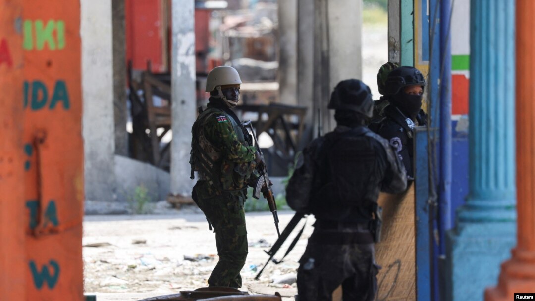 Kenyan police officers patrol as part of a peacekeeping mission, in Port-au-Prince, Haiti, July 17, 2024.
