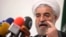 Hasan Rowhani speaks during a campaign rally in Tehran, May 30, 2013.