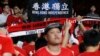 Hong Kong soccer fans boo the Chinese national anthem and chant banner "Hong Kong Independence" during the AFC Asian Cup 2019 qualification soccer match against Malaysia, in Hong Kong, Oct. 10, 2017. 