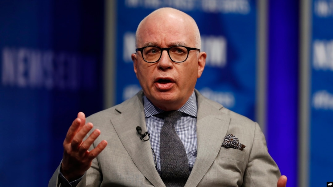 FILE - Author Michael Wolff is pictured at the Newseum in Washington, April 12, 2017, as he moderates a conversation with presidential counselor Kellyanne Conway during a forum titled "The President and the Press: The First Amendment in the First 100 Days." 