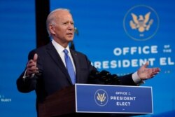 President-elect Joe Biden speaks after the Electoral College formally elected him as president, Dec. 14, 2020, at The Queen theater in Wilmington, Del.