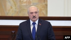 FILE - Belarusian President Alexander Lukashenko speaks during his meeting with parliamentarians, members of the Constitutional Commission and representatives of public administration bodies in Minsk, May 26, 2021.