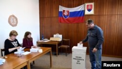 A man casts his vote in Slovakia's presidential election run-off, at a polling station in Trencianske Stankovce, Slovakia, March 30, 2019.