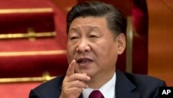 ປະທານປະເທດຈີີນ ທ່ານ Xi Jinping ໃນກອງປະຊຸມໃຫຍ່ ຂອງພັກຄັ້ງທີ 19 ທີ່ສາລາປະຊາຊົນ, ປັກກິ່ງ, 24 ຕຸລາ 2017. 