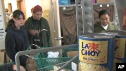 Workers board up the Lindt Cafe in Martin Place, Sydney, Australia, Dec. 23, 2014.