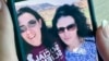 FILE - In this September 2018 image provided by Emma Tsurkov, right, she and sister Elizabeth Tsurkov are shown in California. Elizabeth Tsurkov has been held by an Iraqi militia since her kidnapping nearly two years ago.