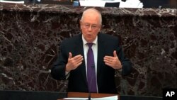 In this image from video, Kenneth Starr, an attorney for President Donald Trump, speaks during Trump's impeachment trial in the Senate at the Capitol in Washington, Jan. 27, 2020.