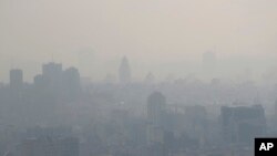Air pollution blankets the skyline in Tehran, Iran, Nov. 30, 2019. 
