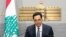 FILE - Lebanese Prime Minister Hassan Diab, gives a speech at the Government House in Beirut, Lebanon.