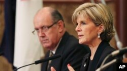 Australian Foreign Minister Julie Bishop speaks alongside Defense Minister David Johnston during press conference, Japan National Press Club, Tokyo, June 12, 2014.