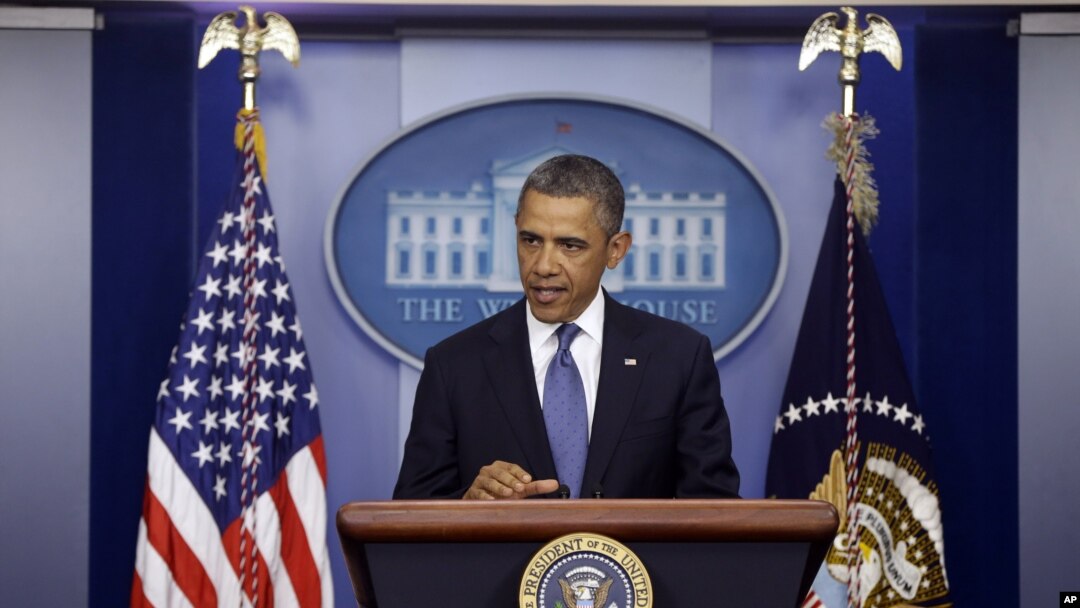 President Barack Obama speaks to reporters in the Brady Press Briefing Room at the White House in Washington after meeting with Congressional leaders regarding the fiscal cliff, December 28, 2012. 