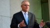 FILE - Australian Prime Minister Scott Morrison speaks during a press conference at Parliament House in Canberra, Aug. 17, 2021. 