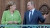 Almanya Başbakanı Angela Merkel ve Rusya Lideri Vladimir Putin.