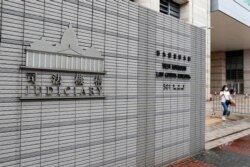 The logo of Judiciary of Hong Kong is seen outside West Kowloon Magistrates' Courts, after a motorcyclist was charged under the newly passed national security law, in Hong Kong, China, July 3, 2020.