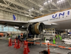 The damaged starboard engine of United Airlines flight 328 is seen following a Feb. 20 engine failure incident, Feb. 23, 2021.