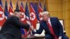 President Donald Trump meets with North Korean leader Kim Jong Un at the border village of Panmunjom in the Demilitarized Zone, South Korea, June 30, 2019. 