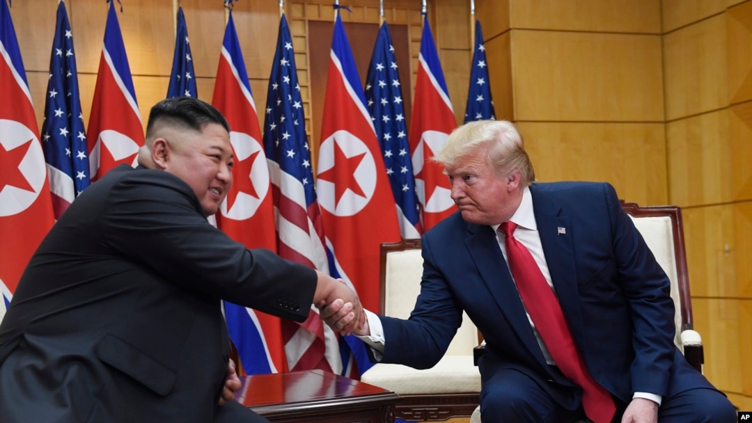 President Donald Trump meets with North Korean leader Kim Jong Un at the border village of Panmunjom in the Demilitarized Zone, South Korea, June 30, 2019. 