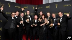 The team from "Game of Thrones" pose with the award for outstanding sound editing for a comedy or drama series for "The Long Night" on night two of the 2019 Creative Arts Emmy Awards, Sept. 15, 2019, at the Microsoft Theater in Los Angeles. 