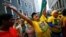Pro-Zuma supporters cheer during the vote of no confidence against President Jacob Zuma in Cape Town, South Africa, Aug. 8, 2017. 