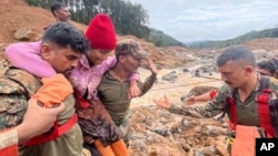 This photograph provided by PRO Defense Kochi shows Indian army soldiers engaged in landslide rescue operations at a village in Wayanad in southern Kerala, India, July 31, 2024. 