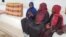 Alaweiah and her daughters, seen June 18, 2019, fled war in Sudan before being arrested in the Libyan desert and later forced to run from their home in Tripoli, Libya.