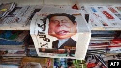 A copy of Iran's Farhikhtegan newspaper sits in a kiosk in Tehran on Nov. 16, 2024, with a drawing of Elon Musk on its front page, as Iranian media referred to a reported meeting between Tehran's ambassador to the United Nations and the tech billionaire earlier this week.