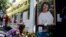 Mexico Honduras Environmentalist Killed: A woman places flowers on an altar set up in honor of Berta Caceres during a demonstration outside Honduras' embassy in Mexico City, Wednesday, June 15, 2016. 