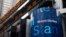 FILE - A Morgan Stanley billboard is displayed in Times Square, New York, Jan. 18, 2011. Morgan Stanley plans to offer savings accounts and certificates of deposits next year to wring more profit from its wealth management clients, executives told Reuters