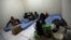 Laid-off workers of Comperj are pictured at a room of the Pousada do Trabalhador (Workers Inn), which closed down after the scandal involving Petrobras, on its last day of operations, in Itaborai March 31, 2015. 