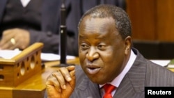 FILE PHOTO: South African Finance Minister Tito Mboweni speaks during his budget speech at Parliament in Cape Town, South Africa, October 30, 2019. REUTERS/Sumaya Hisham -/File Photo