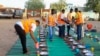 FILE—Volunteers arrange food on plates for internally displaced Muslim devotees breaking fast meals during the Islamic holy month of Ramadan in Gedaref on March 13, 2024.