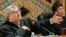 FILE - Judge Alex Kozinski, of the 9th U.S. Circuit Court of Appeals, gestures as Chief Judge Mary Schroeder looks on in San Francisco, Sept. 22, 2003.