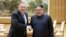 FILE - North Korean leader Kim Jong Un shakes hands with U.S. Secretary of State Mike Pompeo, May 9, 2018, released by North Korea's Korean Central News Agency in Pyongyang.