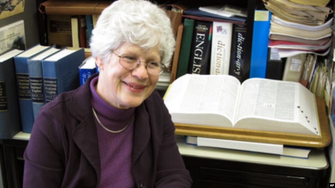 Joan Houston Hall holds the final volume of the newly completed Dictionary of American Regional English in her office in Madison, Wisconsin