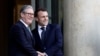 French President Emmanuel Macron, right, welcomes Britain's Prime Minister Keir Starmer as he arrives for a meeting with European leaders on Ukraine and European security at the Elysee Palace in Paris, Feb. 17, 2025.